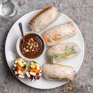 Asian rolls with vegetables and Thai sauce
