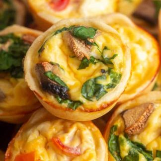 Mini quiche with brie vegetables and cheddar